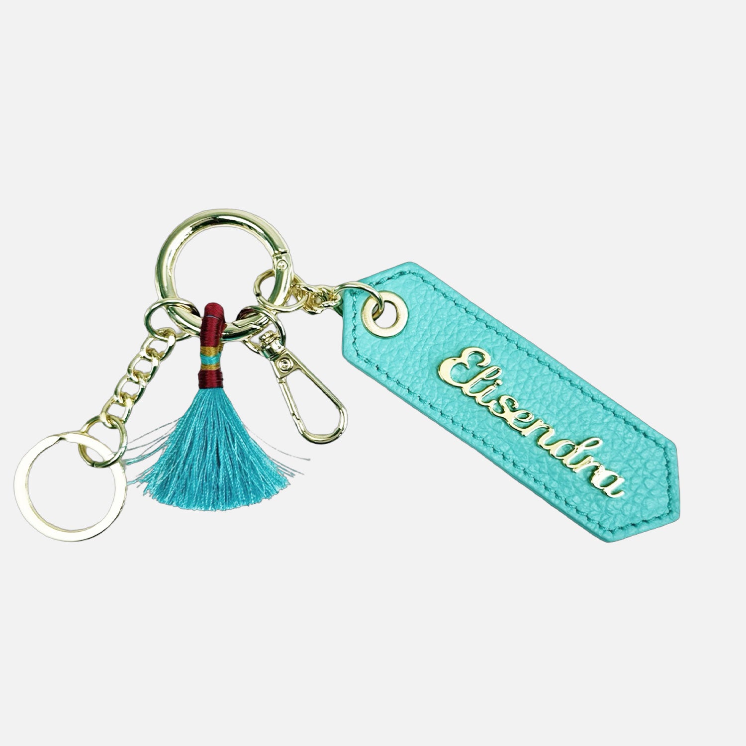 Porta chiavi Charm con nappa e anello Tiffany Pelle Martellata Oro