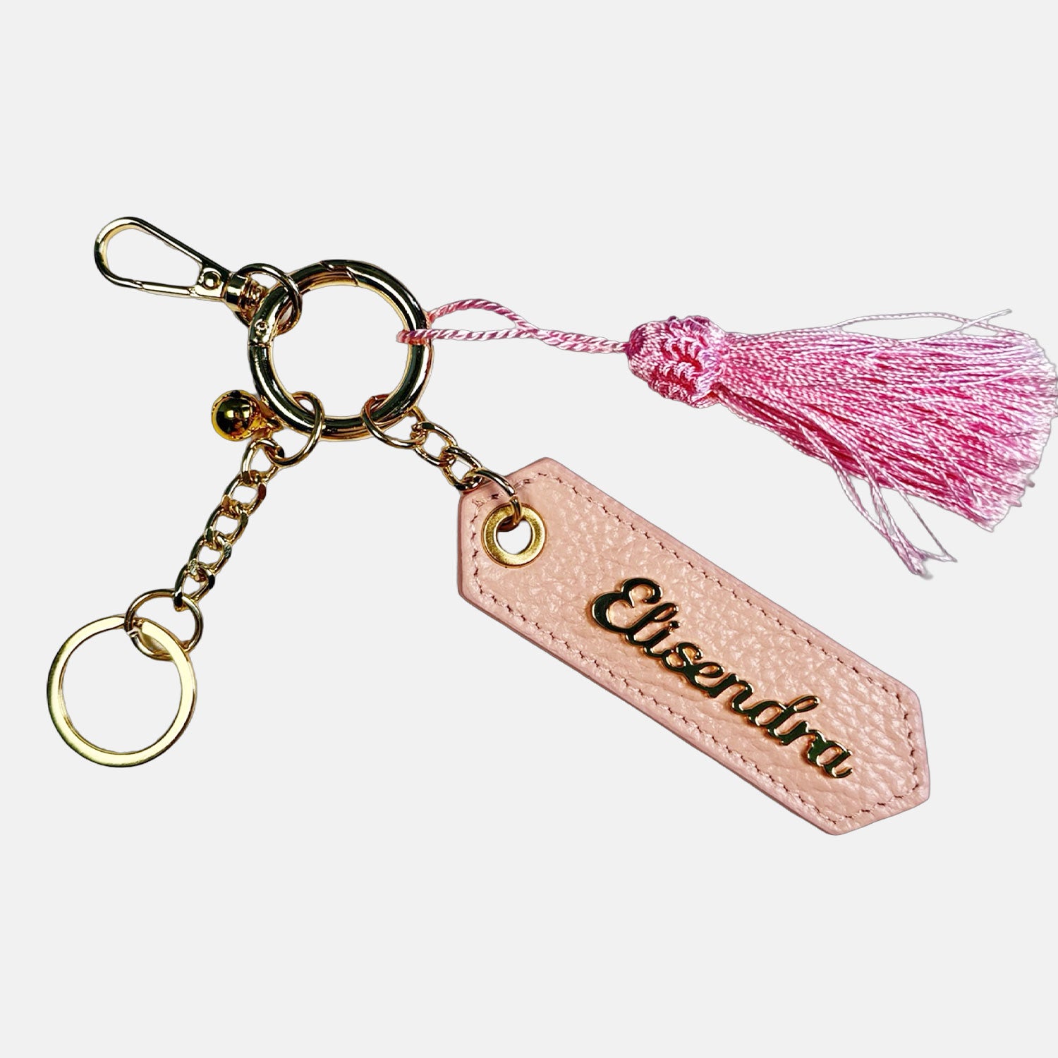 Porta chiavi Charm con nappa e anello Nude Pelle Martellata Oro